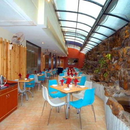 Aj International Otel Bangalore Restoran fotoğraf