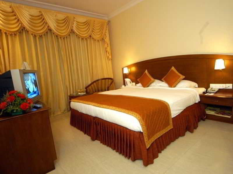 Aj International Otel Bangalore Oda fotoğraf